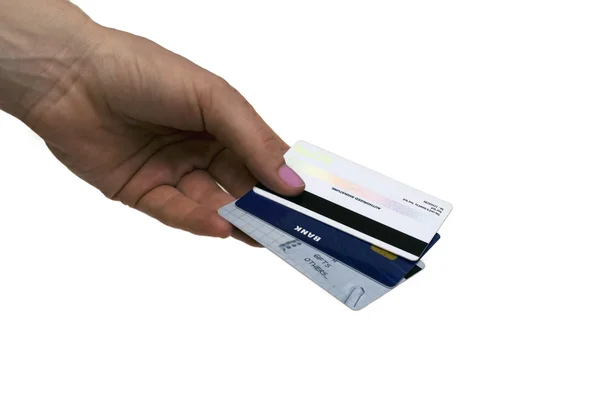 Une main tenant des cartes de crédit — Photo