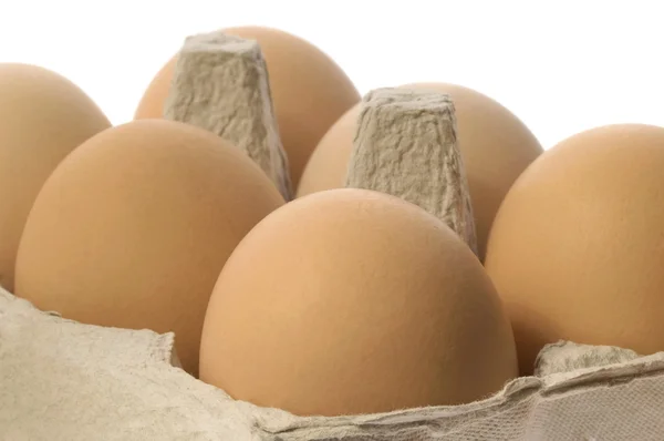 Eggs in a grey cardboard carton box — Stock Photo, Image