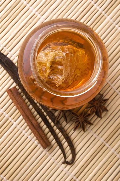 stock image Fresh honey with honeycomb and spices