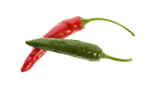 Beyaz izole hot chilli peppers — Stok fotoğraf
