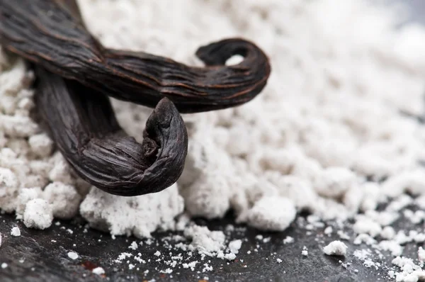Vanilla beans with aromatic sugar — Stock Photo, Image