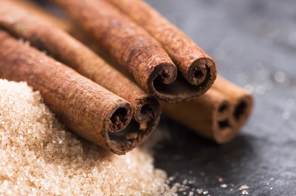 Aromatic spices with brown sugar - cinnamon — Stock Photo, Image