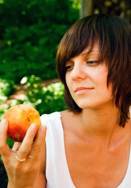 stock image Woman and a Peach