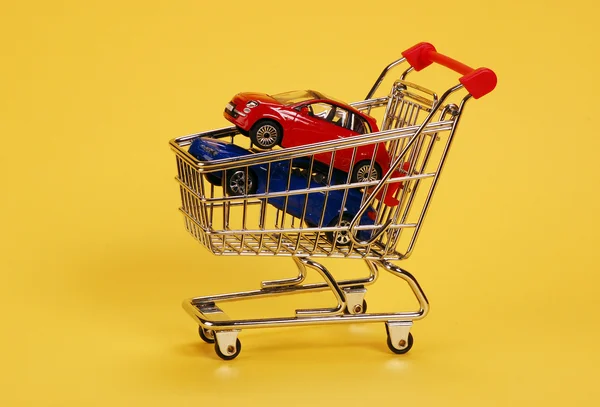Cars in shopping cart — Stock Photo, Image