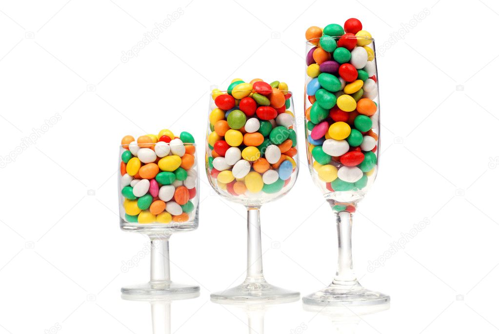 Colored sweet candies in the glasses