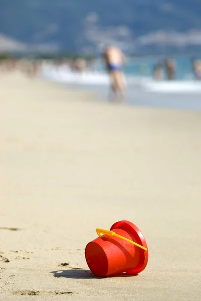 Plastic toys on the beach — Stock Photo, Image