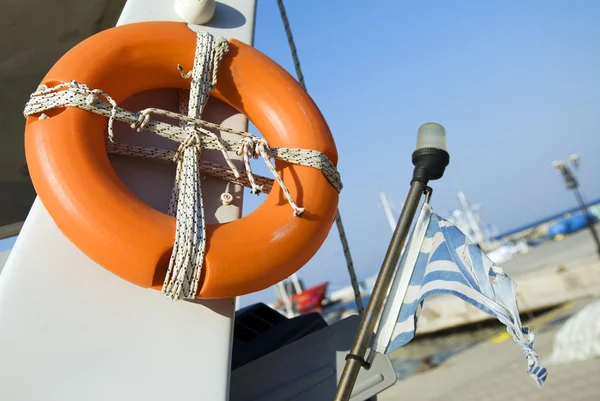 Old life buoy on the boat — Stock Photo, Image