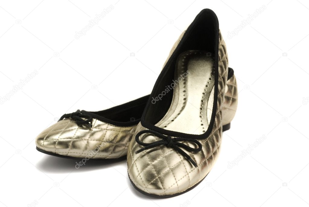 Beautiful women golden shoes