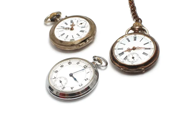 Drie oude horloges geïsoleerd op wit — Stockfoto