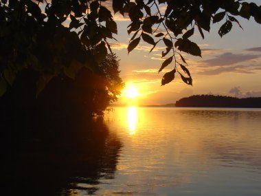 Sunset over lake clipart