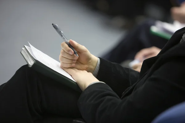 stock image Hands of businessman with notebook