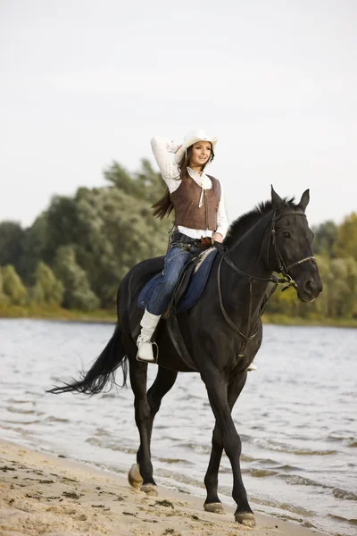 Žena jízda koni — Stock fotografie