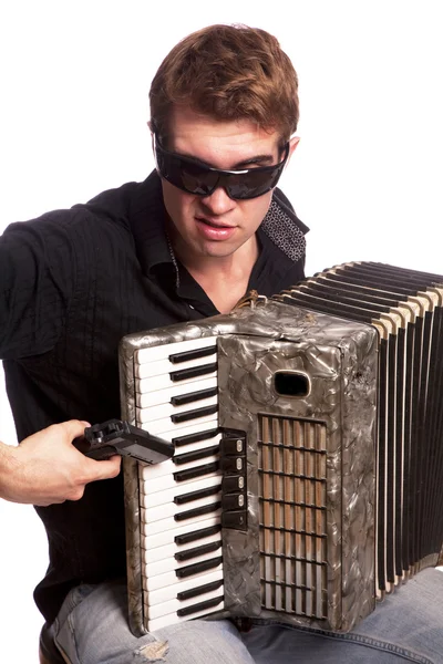 Man met accordeon en gun — Stockfoto