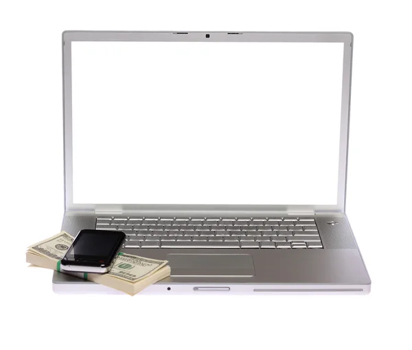 Laptop with cellphone and US money — Stock Photo, Image