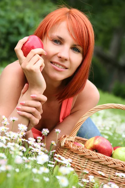 Beautiful girl with a basket — Stock Photo, Image