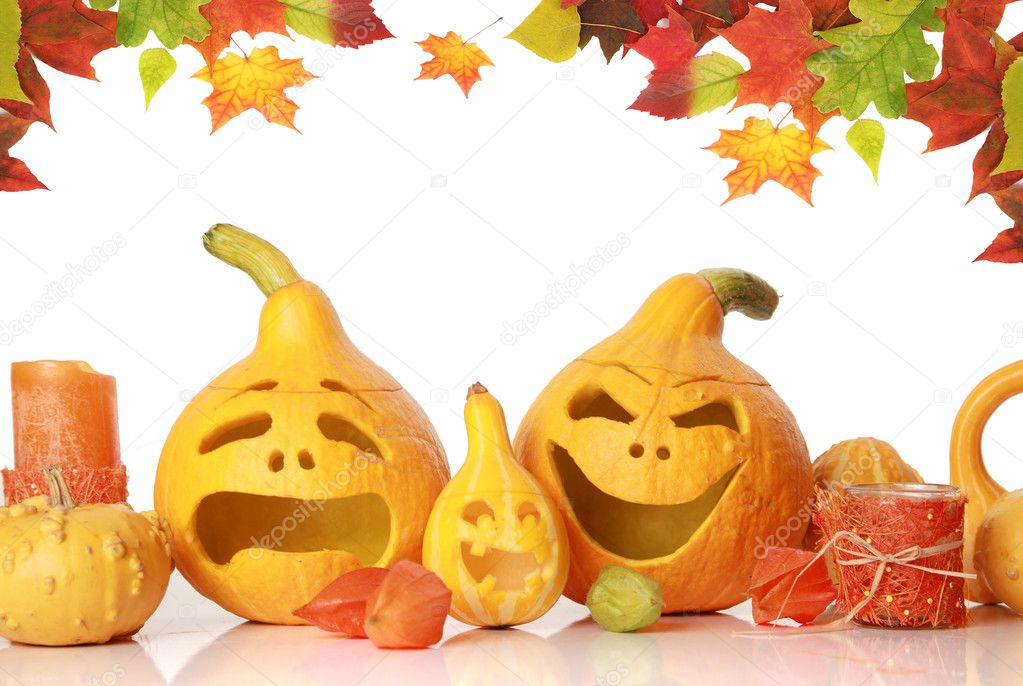 Pumpkins with funny faces on white