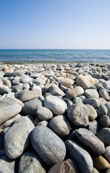 Stenen strand — Stockfoto
