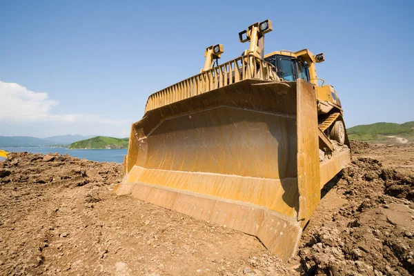 Bir inşaat alanı üzerinde buldozer — Stok fotoğraf