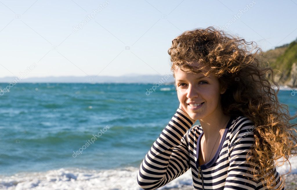Young woman and sea