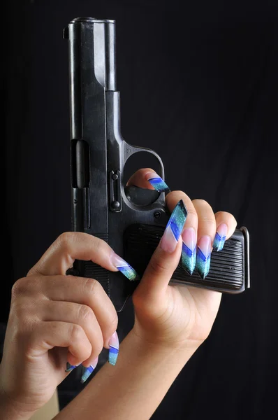 Pistole v ruce — Stock fotografie