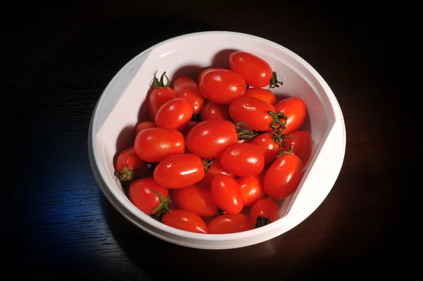 Tomatoes on a table — Stock Photo, Image