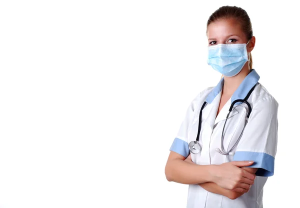 Медсестра со стетоскопом и маской — стоковое фото