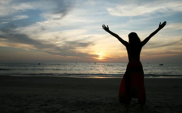 Woman and sunset — Stock Photo, Image