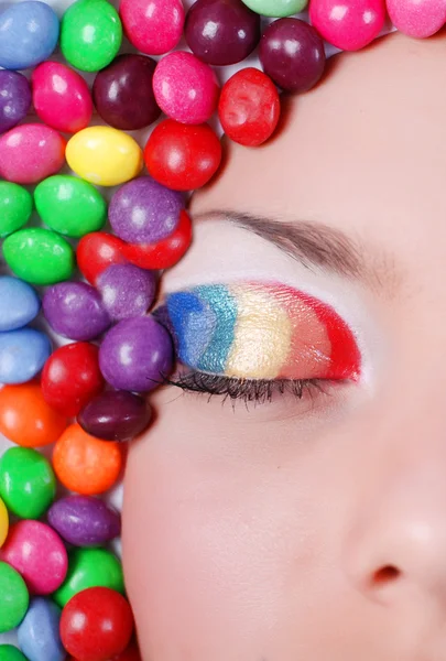 Schoonheid meisje in candys — Stockfoto
