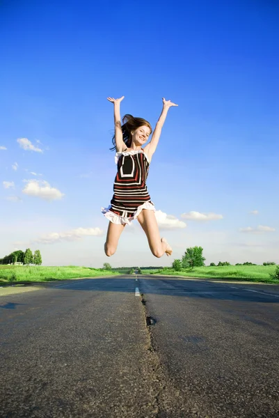 Saltando menina feliz — Fotografia de Stock