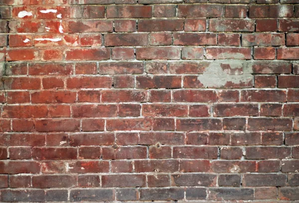 Стена из старого кирпича — стоковое фото