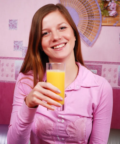Woman with glass of juice — Stock Photo, Image