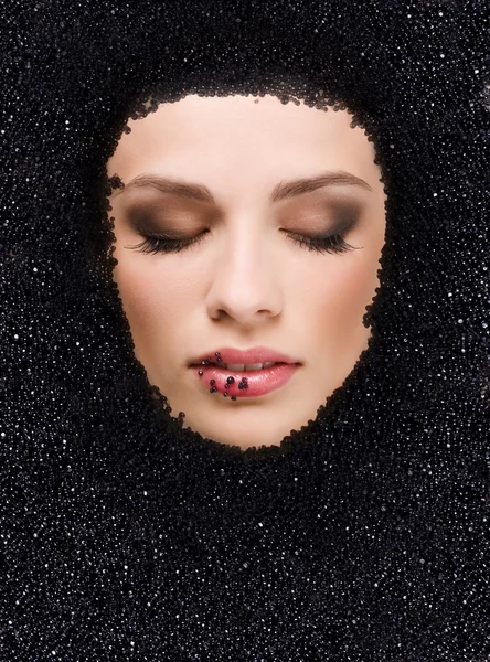 Black caviar and woman — Stock Photo, Image