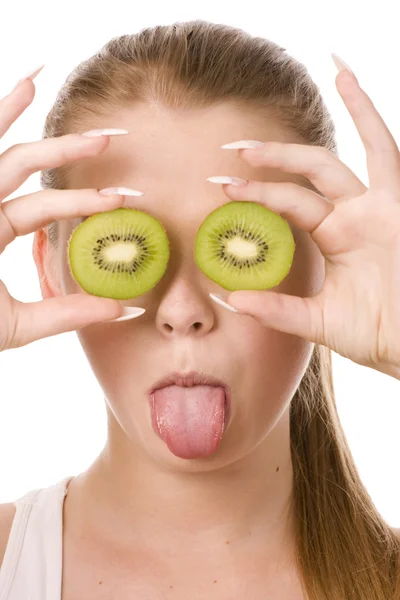 Woman and two slices of kiwi — Stock Photo, Image
