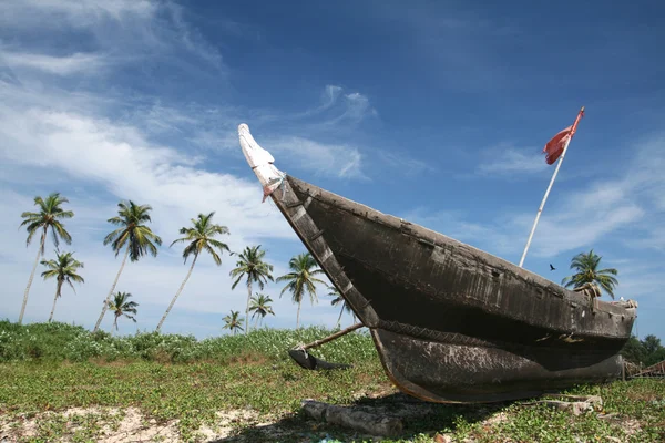 stock image Boat on the beach and blue sky