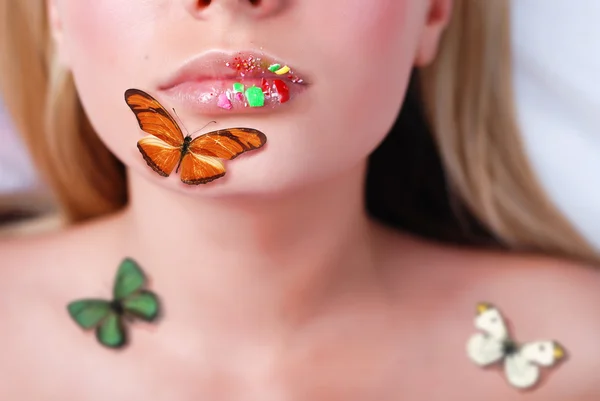 Lips and butterflyes — Stock Photo, Image