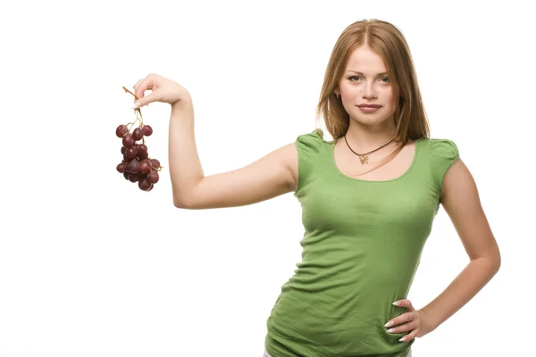 Woman and bunch of grapes — Stock Photo, Image