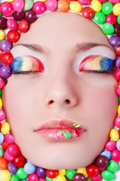Belleza chica en candys — Foto de Stock