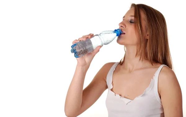 Žena a láhev vody — Stock fotografie