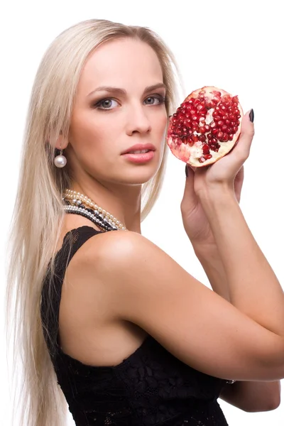 Vrouw en granaatappel — Stockfoto
