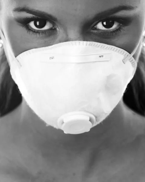 Woman in white respirator — Stock Photo, Image