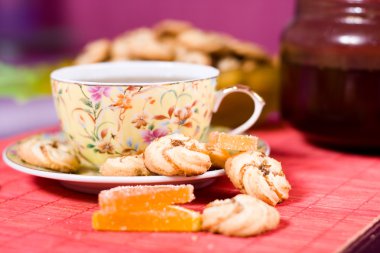 Cup of tea and cookies clipart