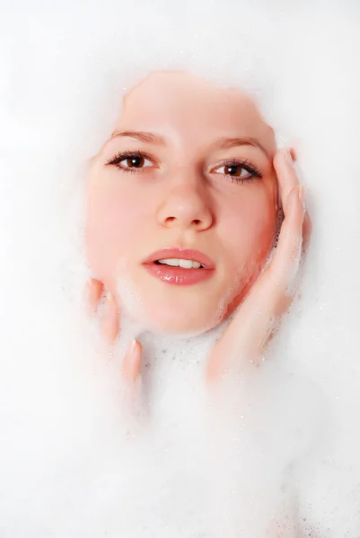 Woman and white foam — Stock Photo, Image