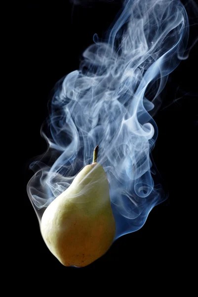 Green pear and smoke — Stock Photo, Image