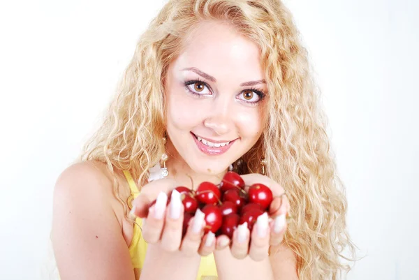 Cherry in hands — Stock Photo, Image