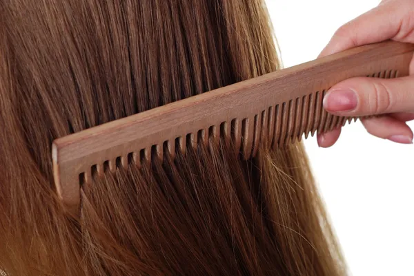 Długie włosy i grzebień — Zdjęcie stockowe