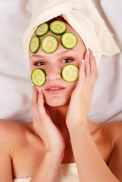 Woman in mask from cucumber — Stock Photo, Image