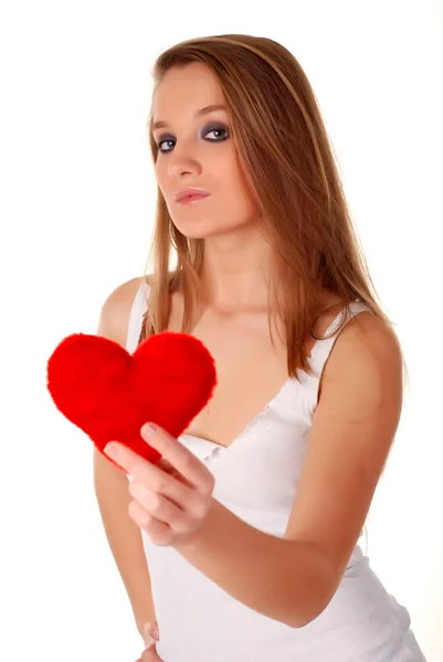 Woman and artificial red heart — Stock Photo, Image