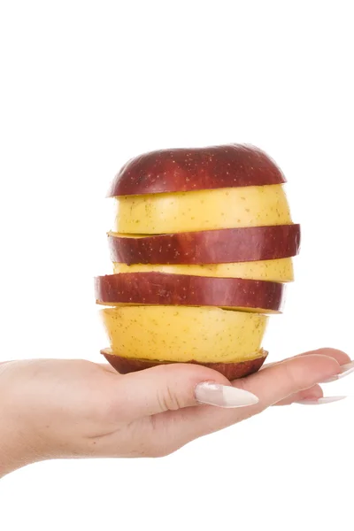 Slices of apples and female hand — Stock Photo, Image