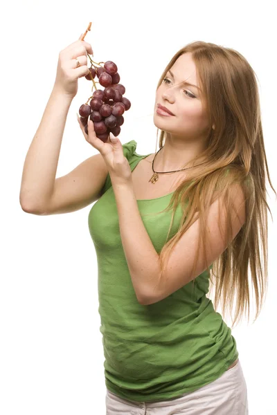 Woman and bunch of grapes — Stock Photo, Image