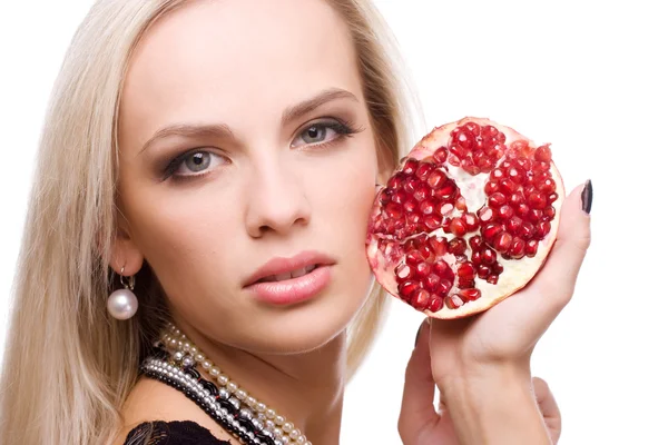 Woman and pomegranate — Stock Photo, Image